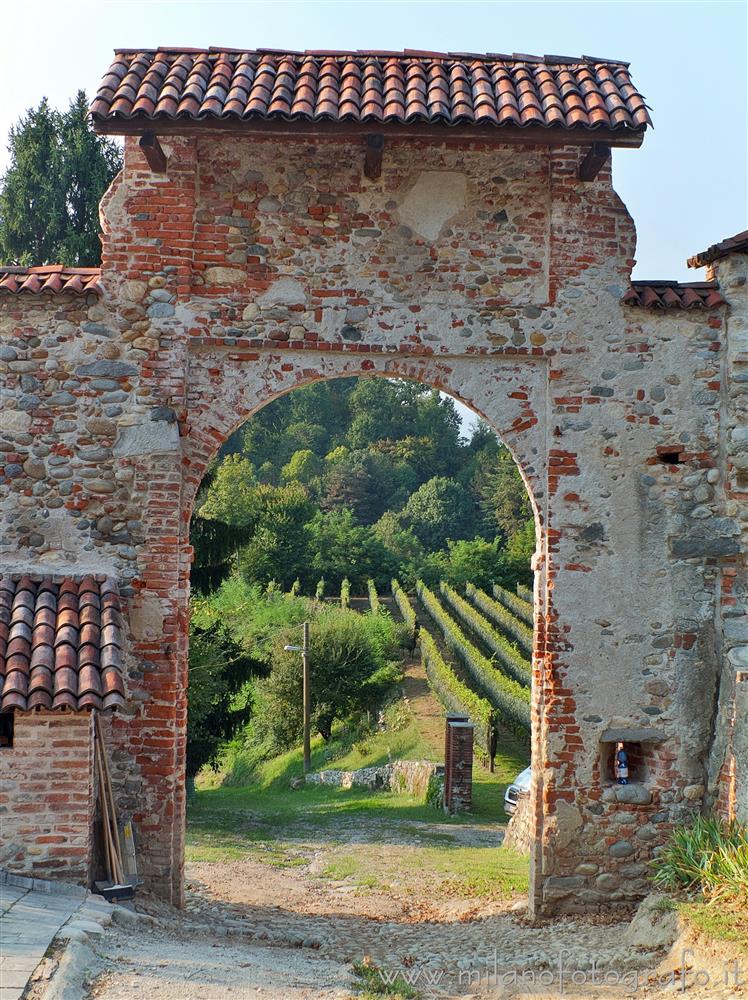 Cossato (Biella, Italy) - The vineyards of Castellengo seen through the Gate of the Moor of the Castle of Castellengo